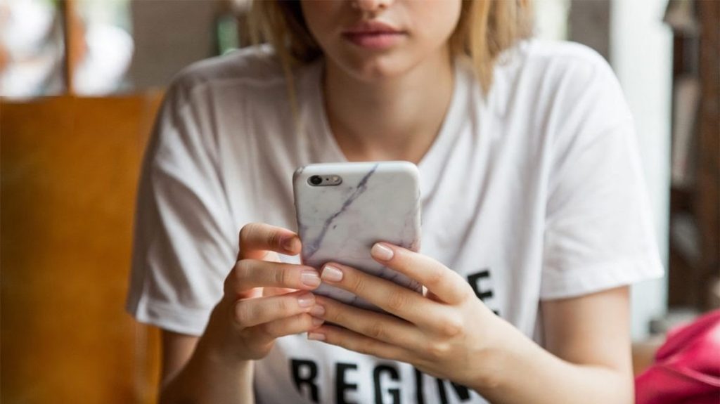A girl breaking up over the phone